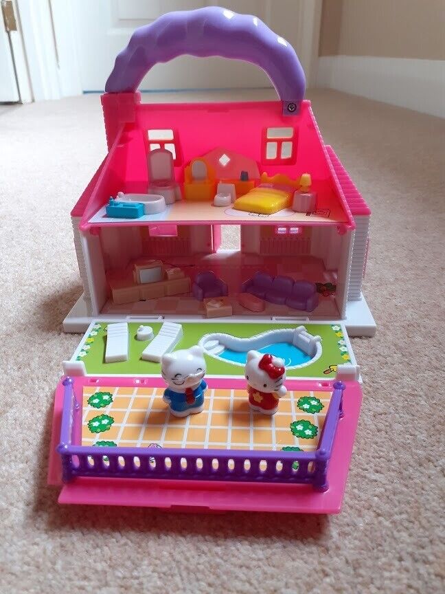 hello kitty carry along mini doll house